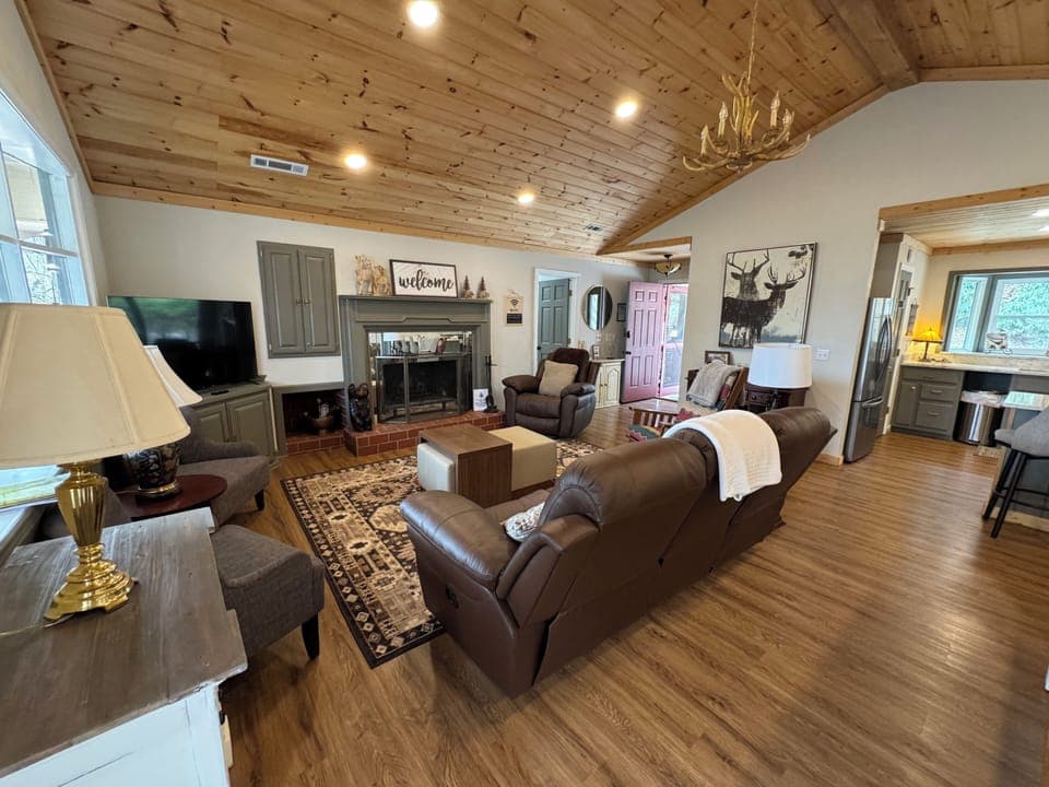 Main level Living with wood burning fireplace