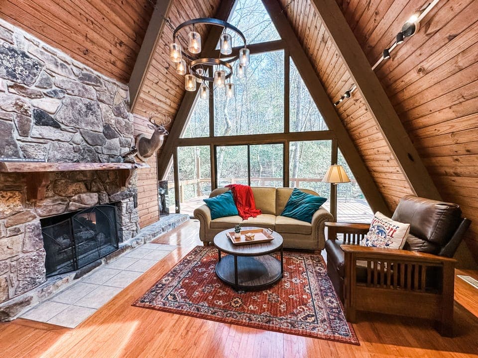 Living room with sleeper sofa & gas logs 