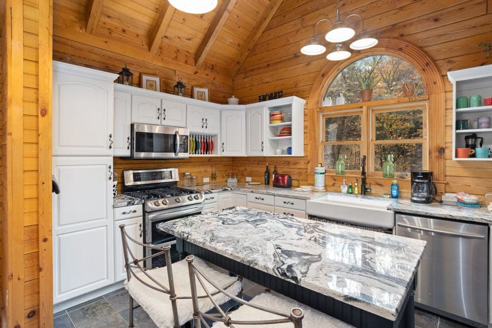 Kitchen With Granite Counters and Stainless Appliances