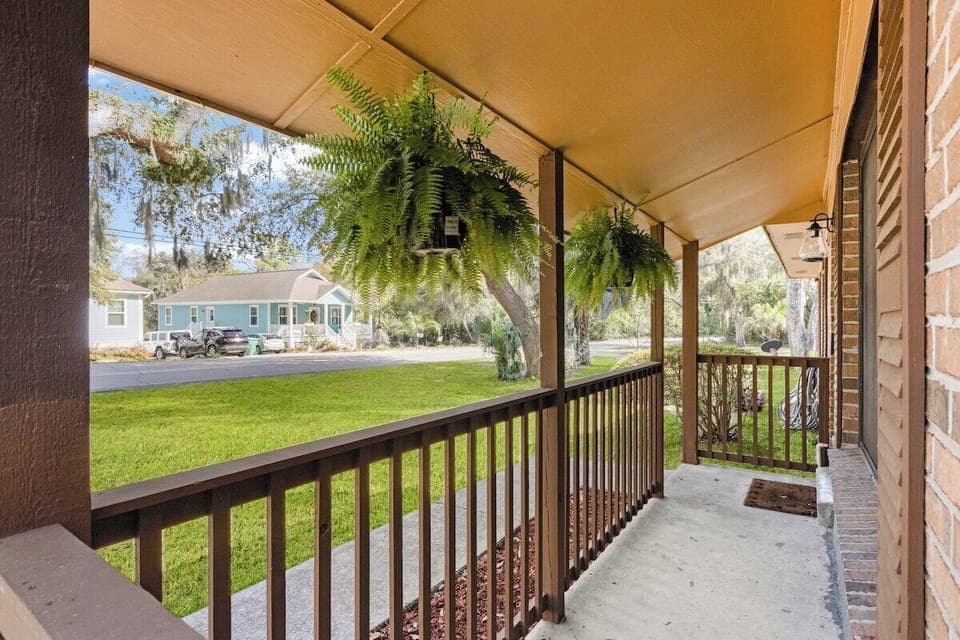 Front porch with smart lock on the front door for easy entry and check-in