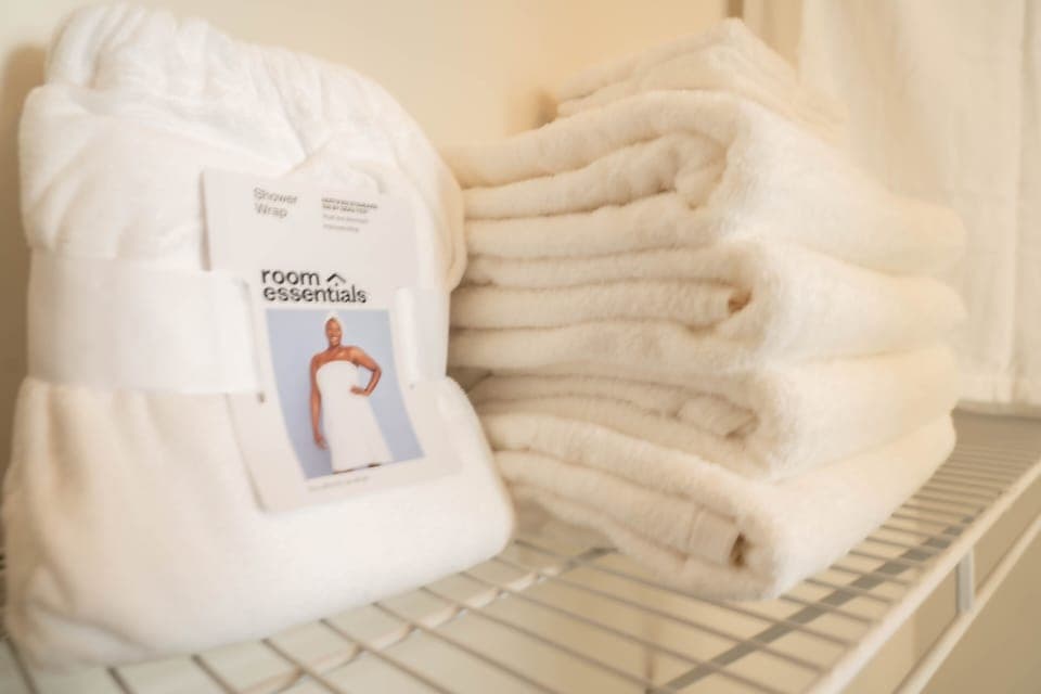 Extra towels and linings, and shower robe in the walk in closet in bedroom.
