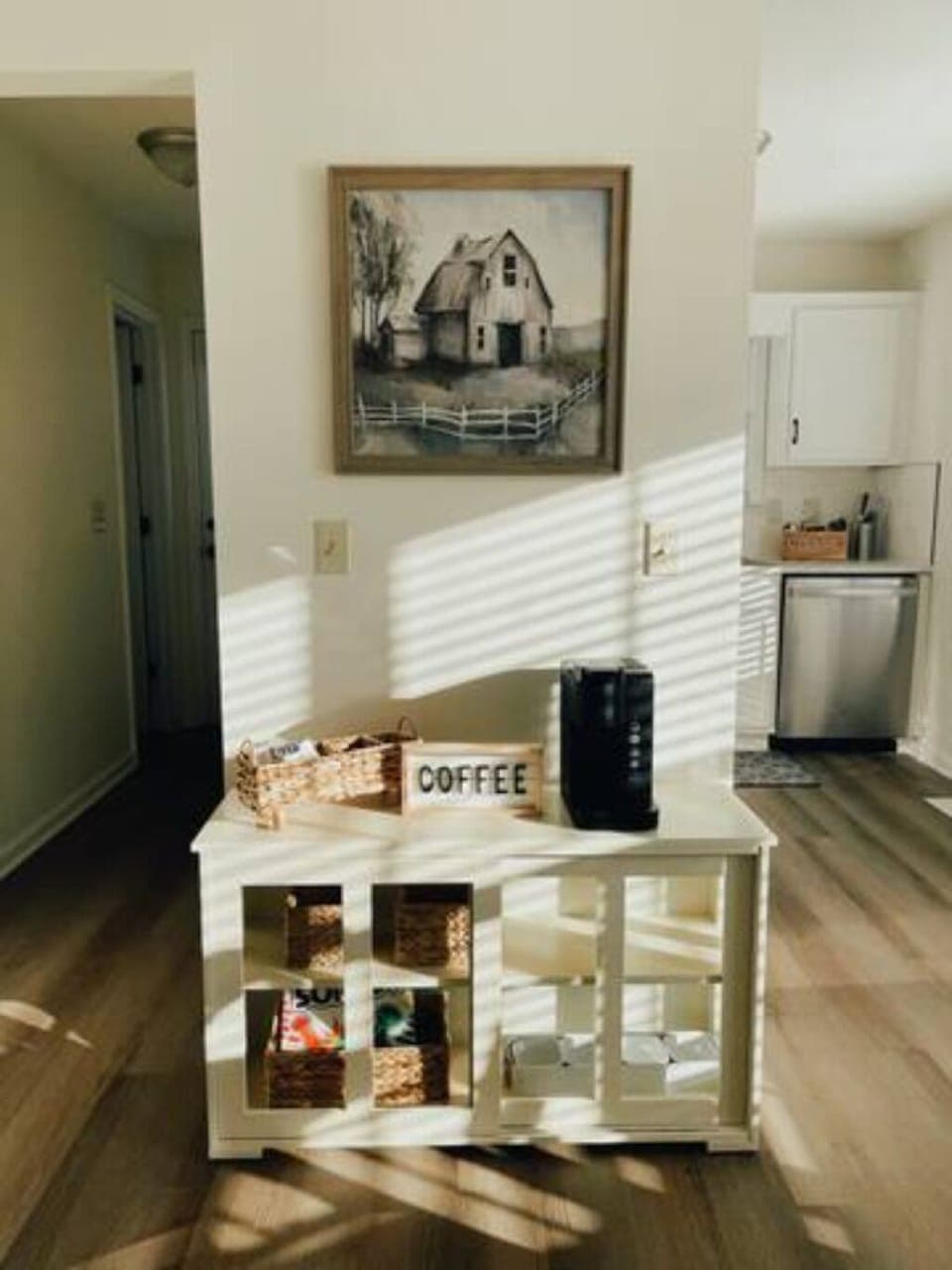 Coffee bar. Kitchen on right. Hall to half-bath on left.