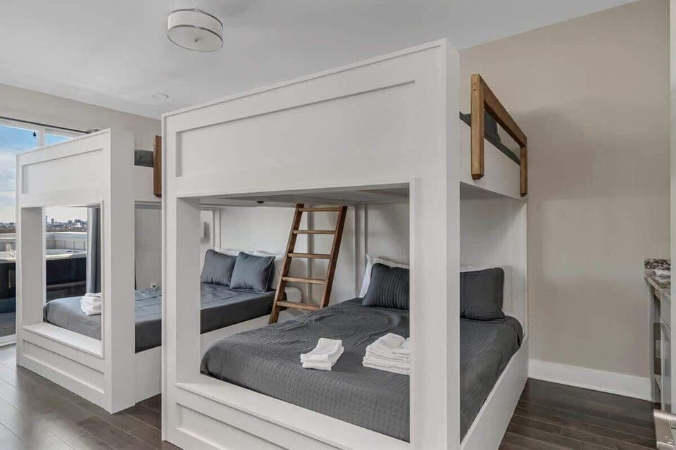 Bedroom 4 - 2 Queen over Queen bunk beds. Top floor w/access to the balcony!
