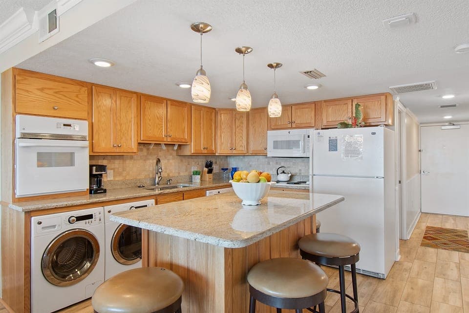 Large Kitchen Area, With Washer/Dryer in Condo and Full Sized Appliances!