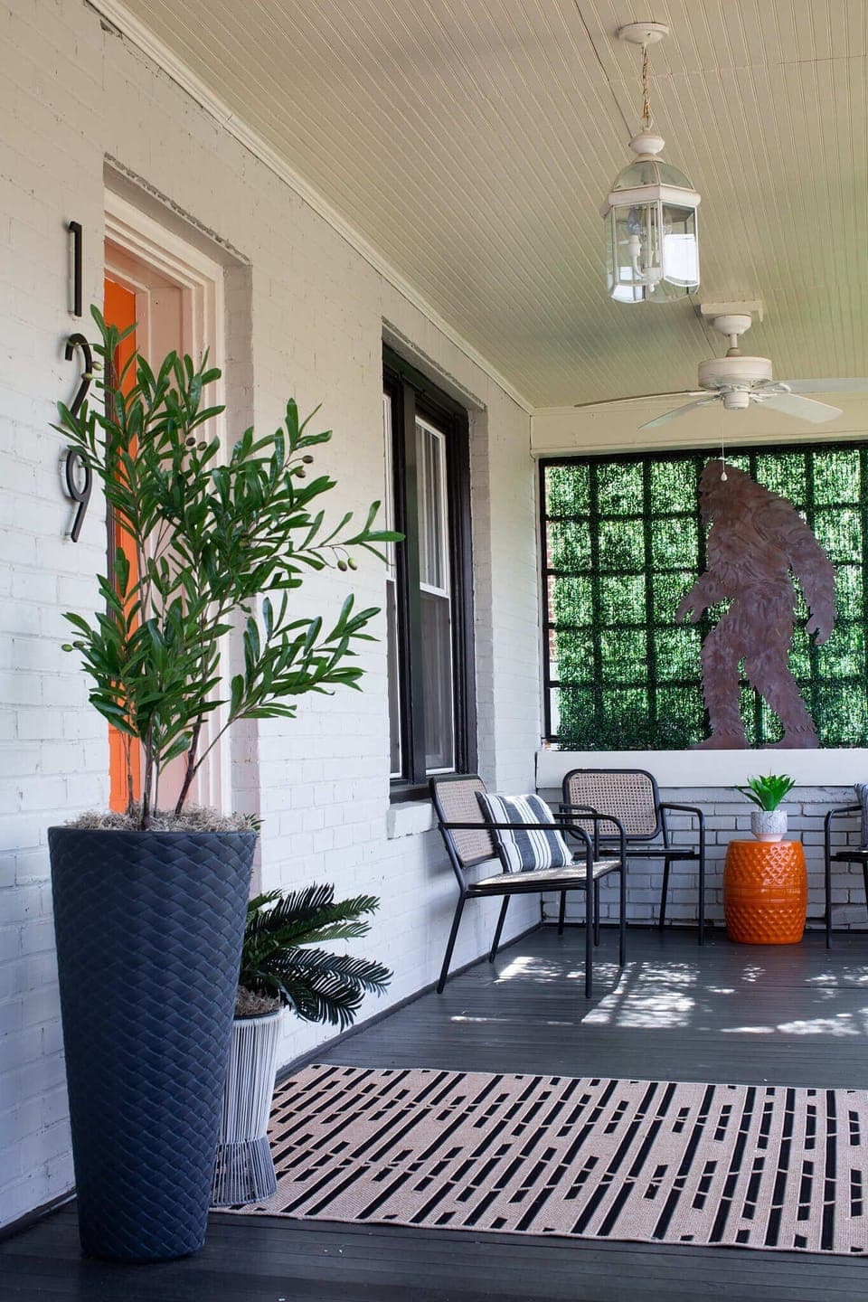 Inviting cozy front porch seating area Smart Keyless lock for easy entry anytime
