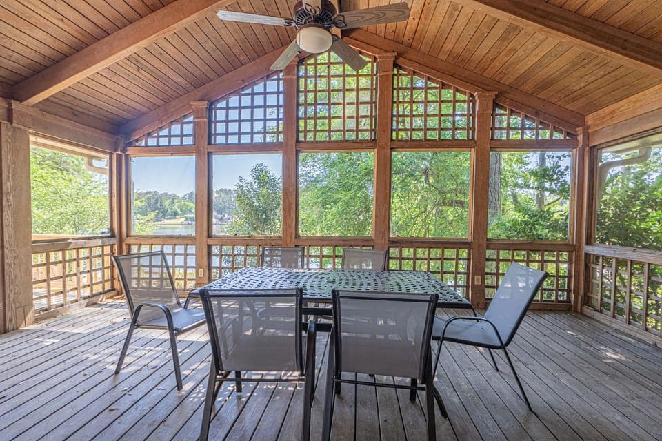 Fabulous screened-in porch. Great for meals and viewing the lake.