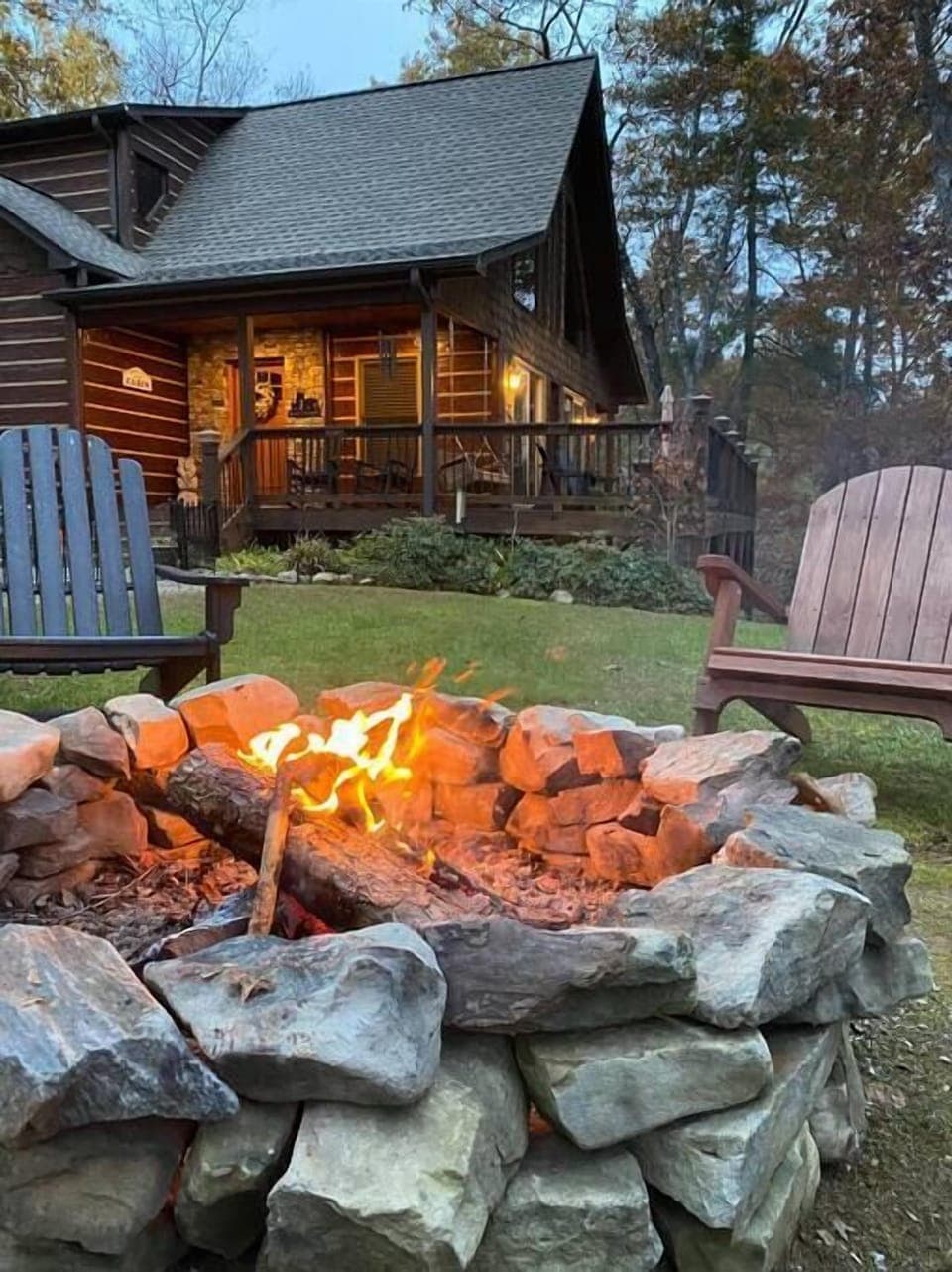 Fire pit with Adirondack chairs, firewood supplied. Deck with porch swing, rockers, lounge chairs, dining and gas grill. 