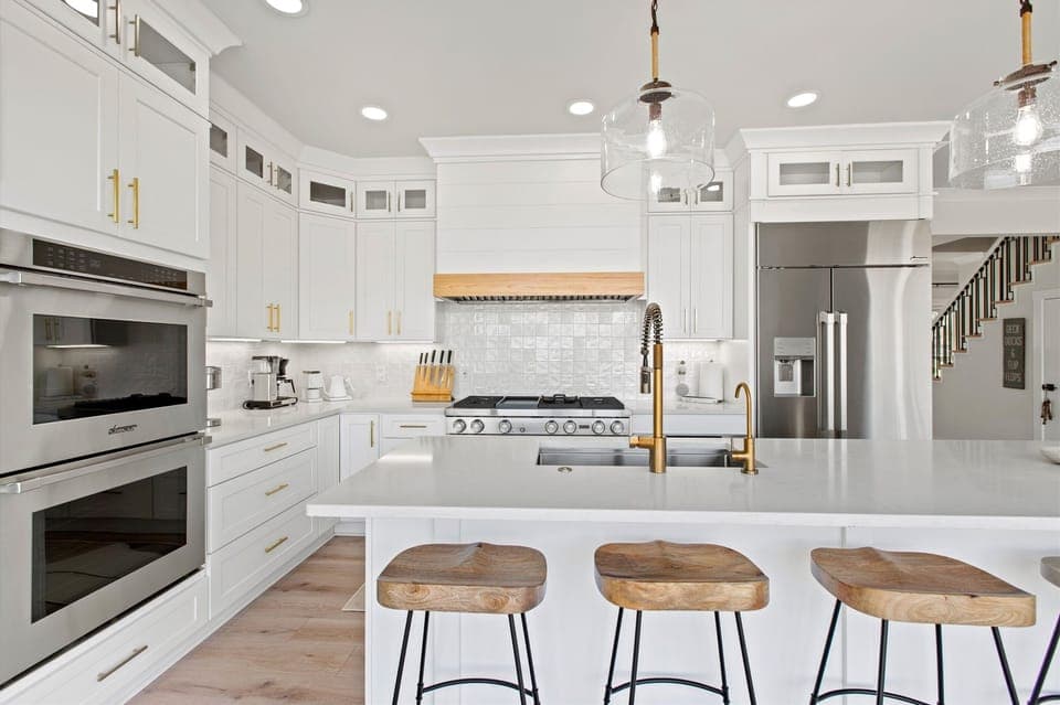 Welcome to the heart of our inviting home—a kitchen island that effortlessly combines functionality with a welcoming ambiance.
