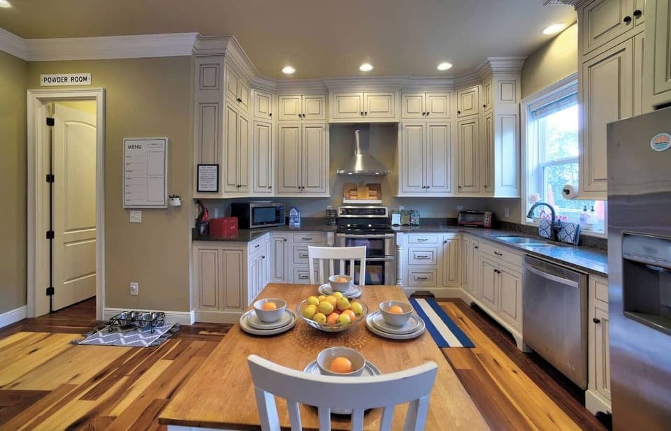 Main Floor Kitchen: full fridge, double ovens, microwave, dishwasher, enough Dropps dishwasher pods to get you started, toaster oven, blender, Instapot, crockpot, hand mixer, waffle maker, popcorn maker, baking supplies & grill utensils
