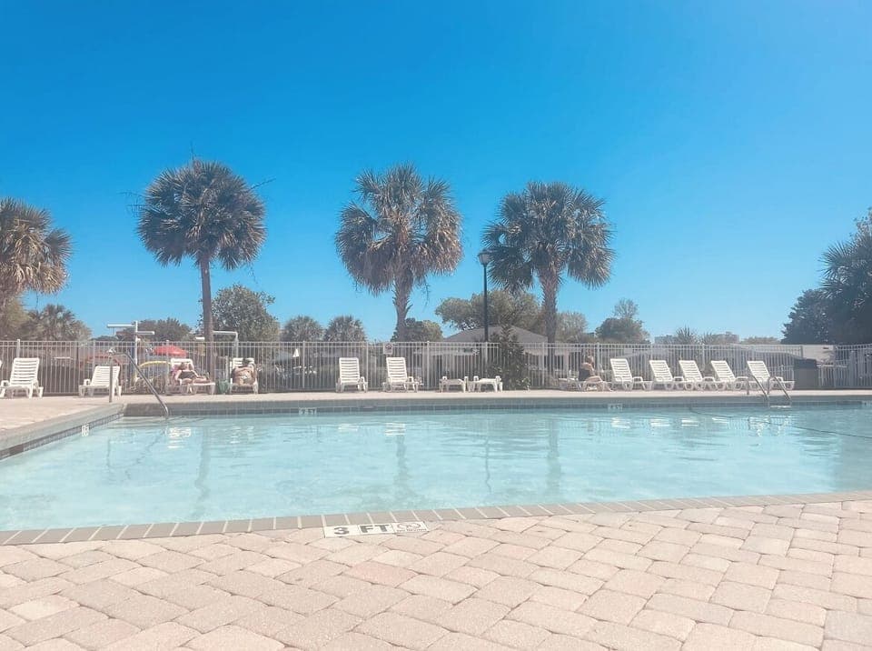 1/3 neighborhood pools; another outdoor pool and indoor pool on property