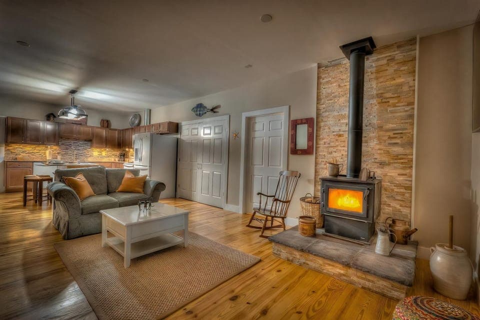 Living room with wood burning fireplace