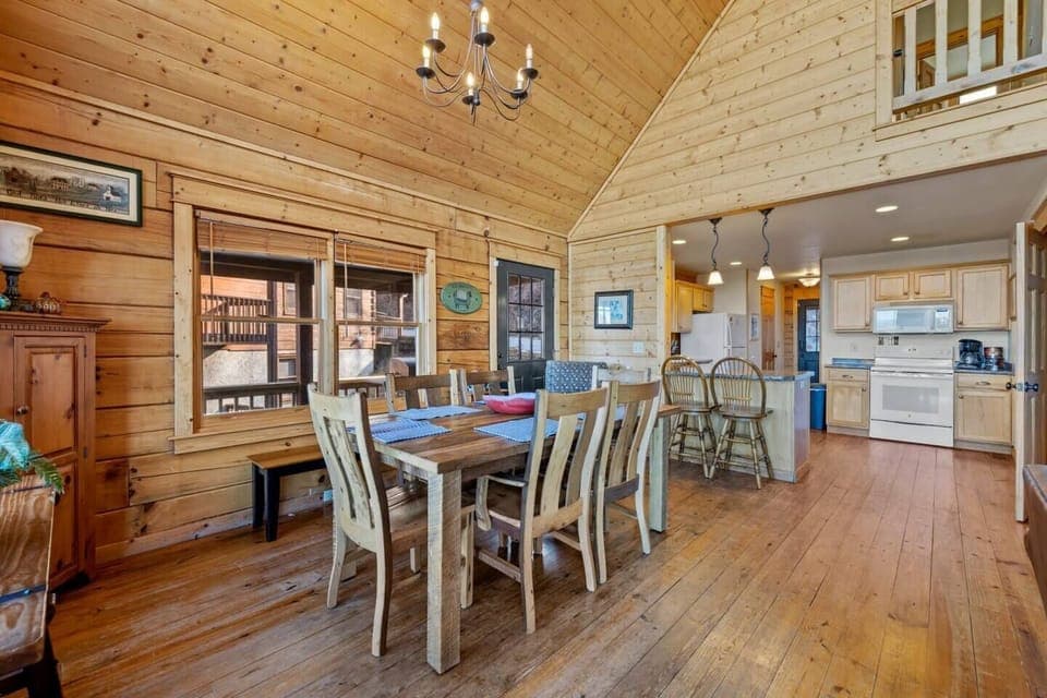 The dining room stretches to the kitchen and island that seats two. 