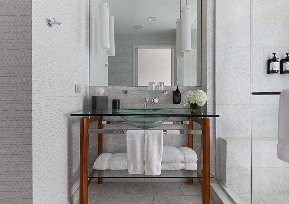 Begin your morning with bright mirrors and a clean, airy bath.
