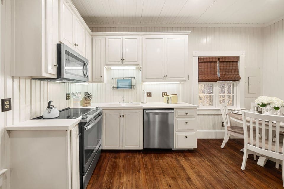 Kitchen is outfitted with a smooth top electric range