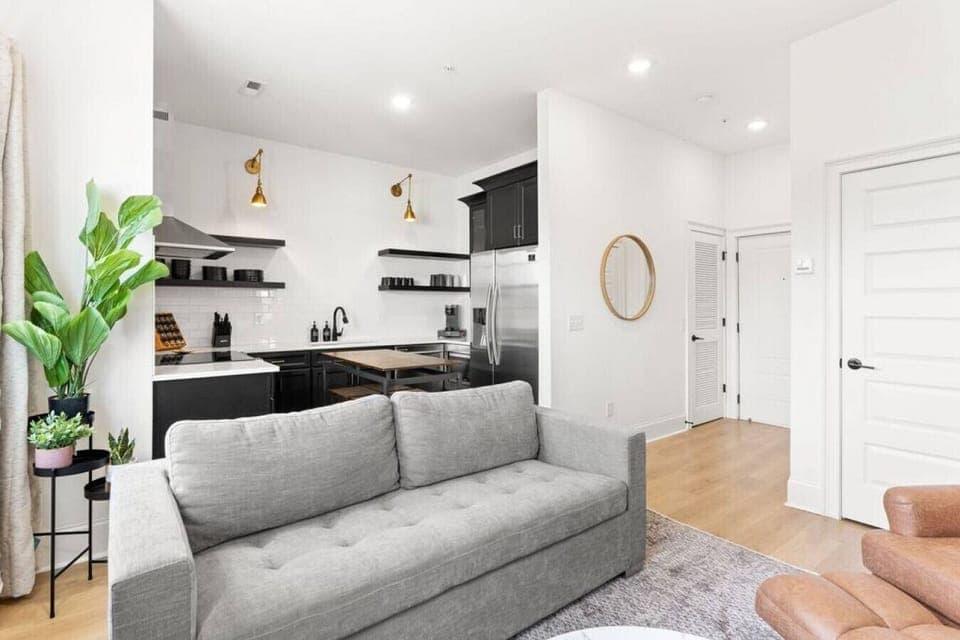 Our cozy living room is a great space to relax, with a comfortable couch / queen sleeper sofa, recliner, lots of natural light, and a Smart TV with all the streaming apps.