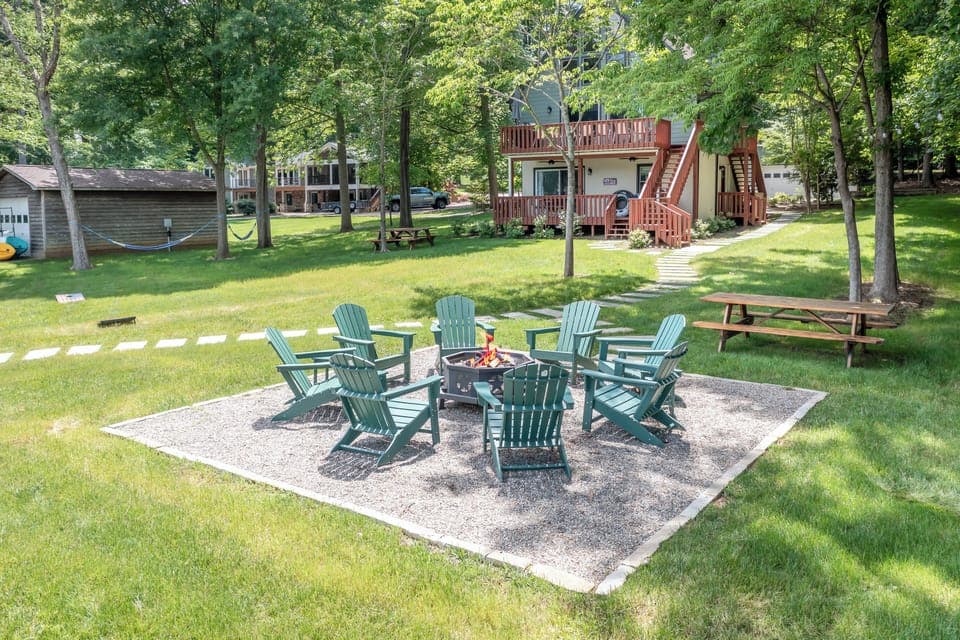 Firepit area with Adirondack chairs - ideal for evenings by the lake