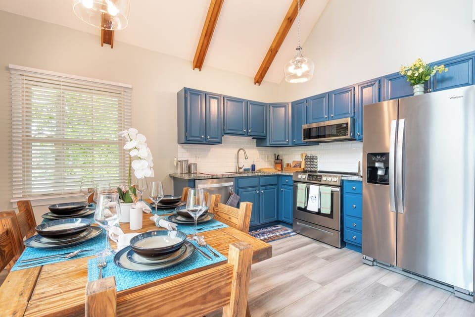 Main level kitchen & dining - fully equipped for group stays