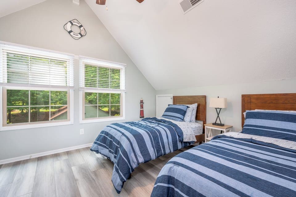 Loft bedroom with two twin beds - great for kids or extra guests