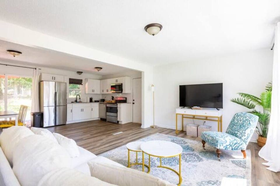 Spacious Living Area Seamlessly Blending with Kitchen and Dining Space, Offering Serene Ambiance