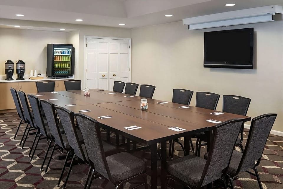 Host productive meetings with bright lighting and refreshment station.