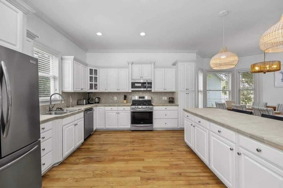 Modern Fully-Equipped Kitchen: Prepare gourmet meals with ease in our kitchen, boasting state-of-the-art appliances and ample counter space. - The Tiara - Murrells Inlet, SC