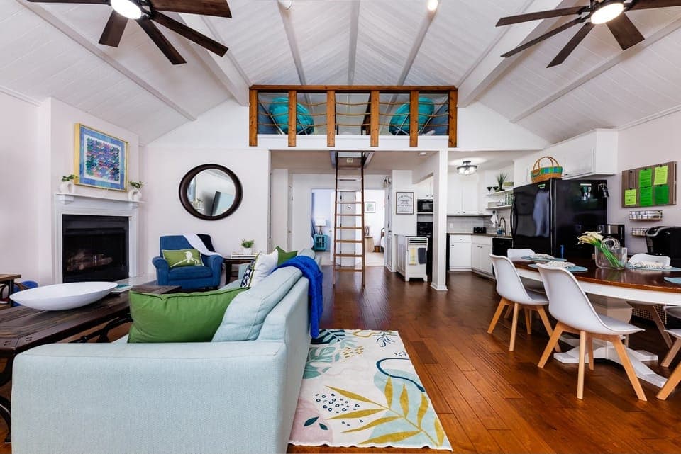 Modern open concept layout with airy vaulted ceilings 