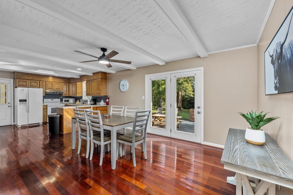 Dining area - table comfortably seats 6 - back patio access.
